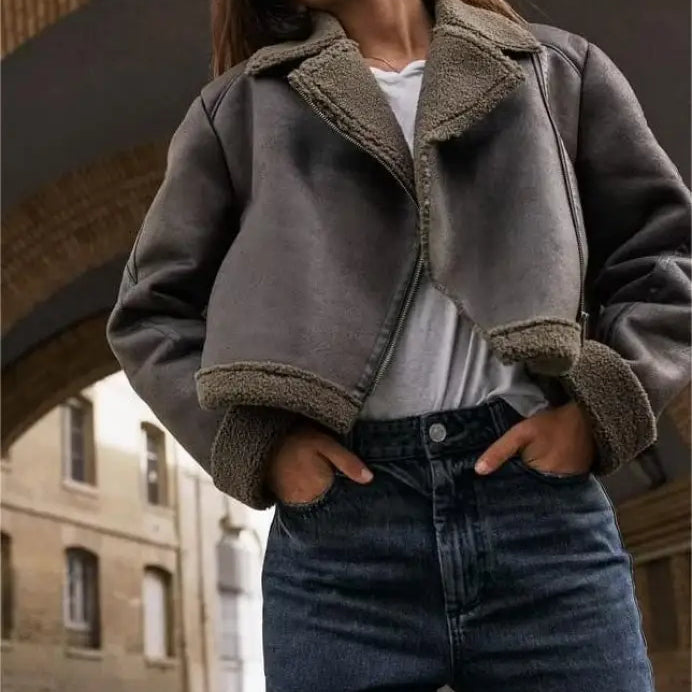 Gray shearling jacket with fuzzy collar and cuffs, featuring fleece short stitching