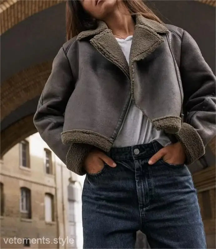 Gray shearling jacket with fuzzy collar and cuffs, featuring fleece short stitching
