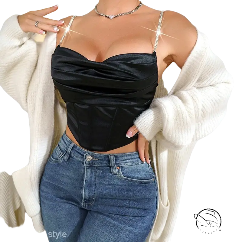 Shiny black boning crop top with rhinestones, ruched strapless style, blue jeans, white cardigan