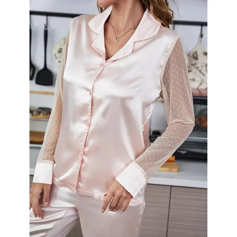 Pink satin pajama set with sheer polka dot sleeves from Silk Mesh Pajamas Set with Long Sleeved Solid Color Pants