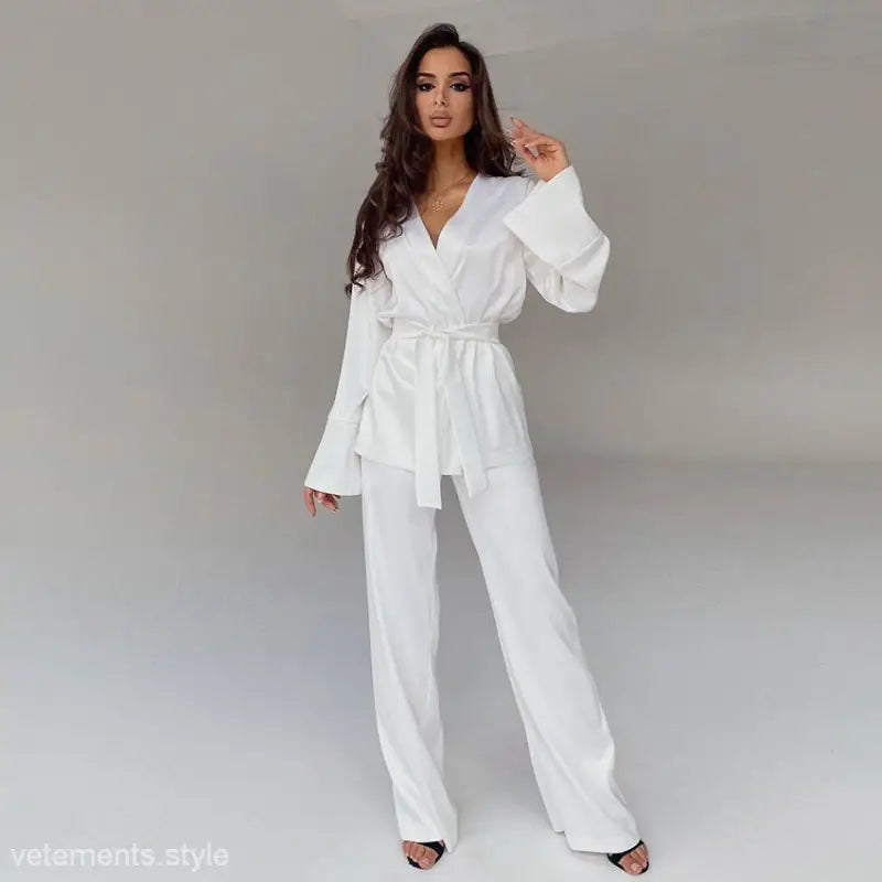 White long-sleeved jumpsuit with wrap top and wide-leg pants, part of skin friendly cardigan pajamas