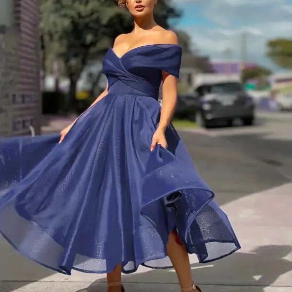 Elegant navy blue Slim A-Line Vetements dress with off-shoulder design and flowing skirt perfect for stylish occasions