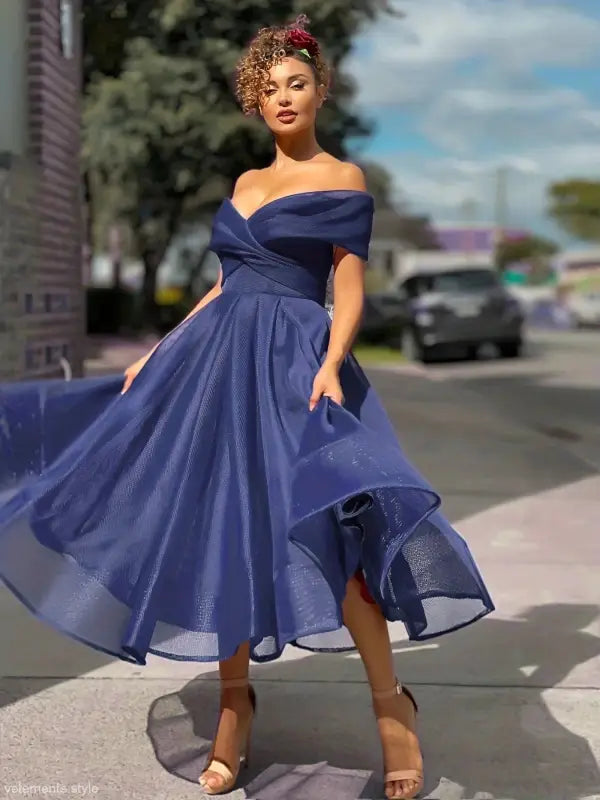 Elegant navy blue Slim A-Line Vetements dress with off-shoulder design and flowing skirt perfect for stylish occasions