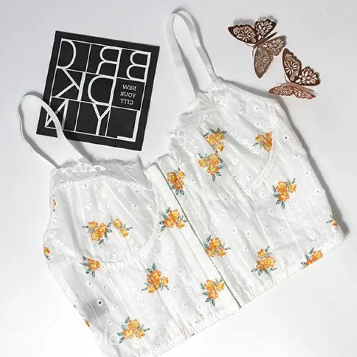 White floral eyelet corset top in slim lace camisole with tulle accents