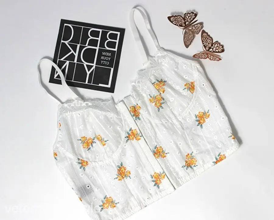 White floral eyelet corset top in slim lace camisole with tulle accents