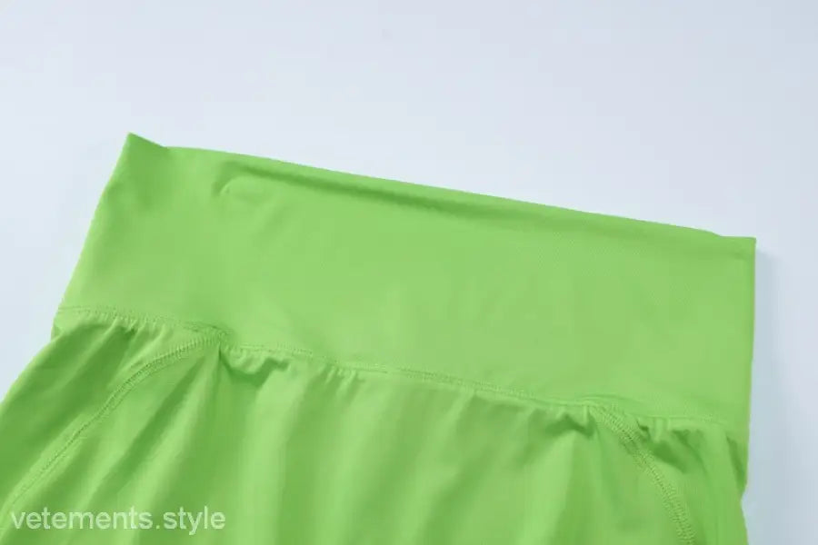 Lime green high-waisted leggings for slim shorts suit styling in summer vest and shorts ensemble