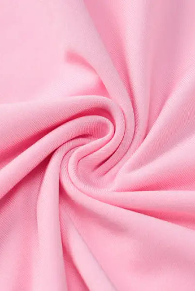 Swirled pink fabric on slimming sheath camisole dress for parties and clubs