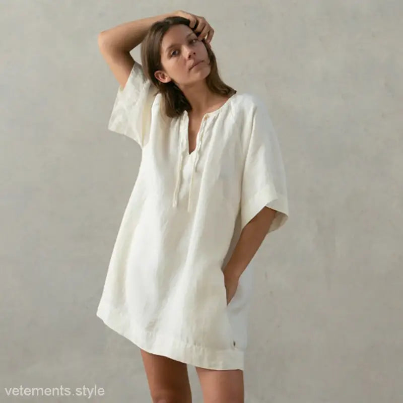 Loose-fitting soft cotton nightdress in apricot with pockets and tie sleeves
