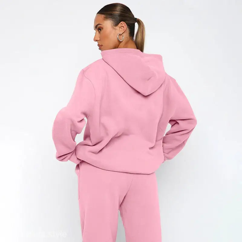 Pink hooded sweatsuit with soft touch trousers and warm comfortable long sleeve sweater