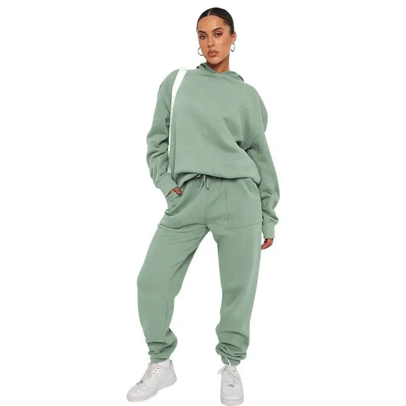 Mint green soft touch trousers with warm comfortable long sleeve sweater and white sneakers