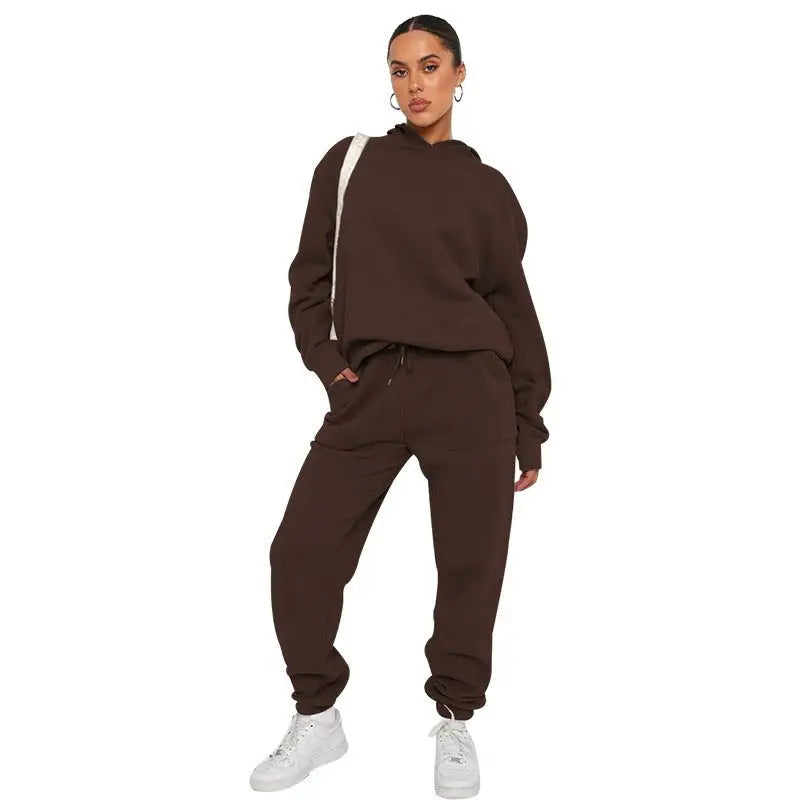 Woman wearing soft touch trousers and warm comfortable long sleeve sweater with white sneakers