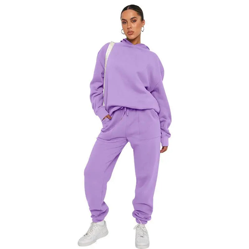 Woman wearing lavender soft touch trousers and a warm comfortable long sleeve sweater