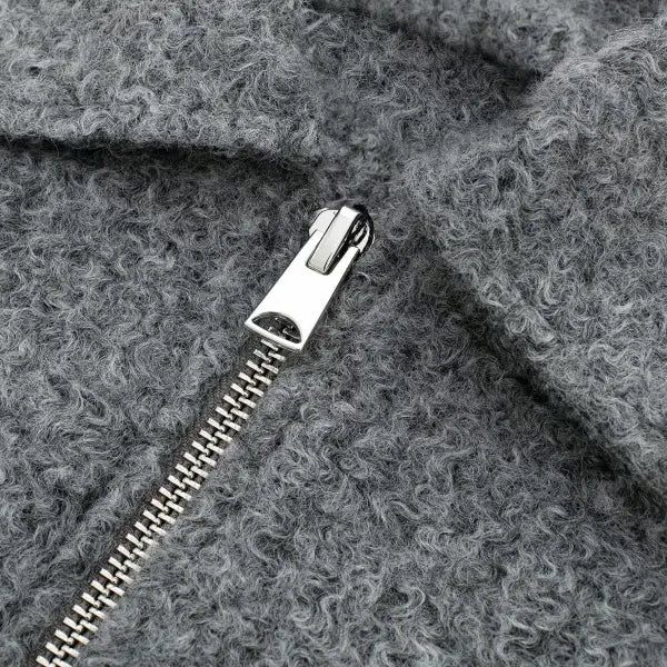 Metal zipper on gray woolen fabric of Soft Tweed Jacket with winter polo collar