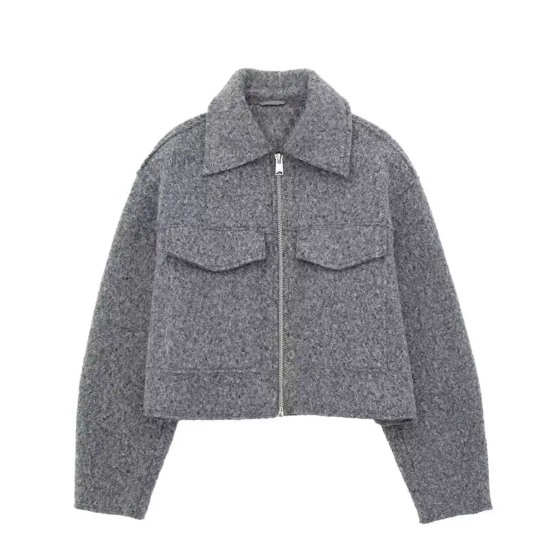 Gray wool cropped soft tweed jacket with zipper front and chest pockets for winter wear