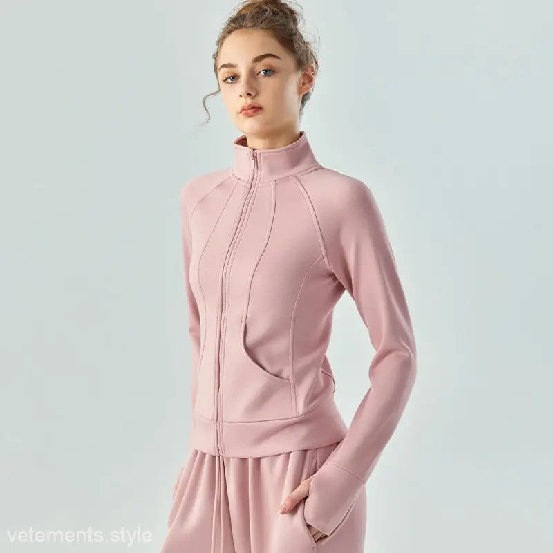 Pink zip-up athletic jacket with high collar and fitted silhouette in linen green and Haiyan Ash Air Layer Coat