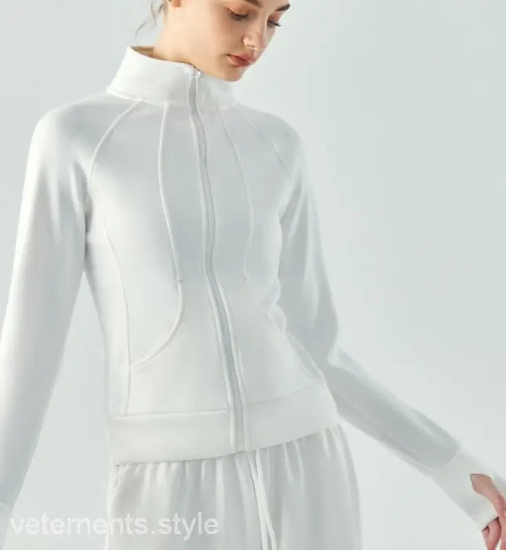 White zip-up athletic jacket with high collar and fitted silhouette in linen green and Haiyan Ash for spring fall