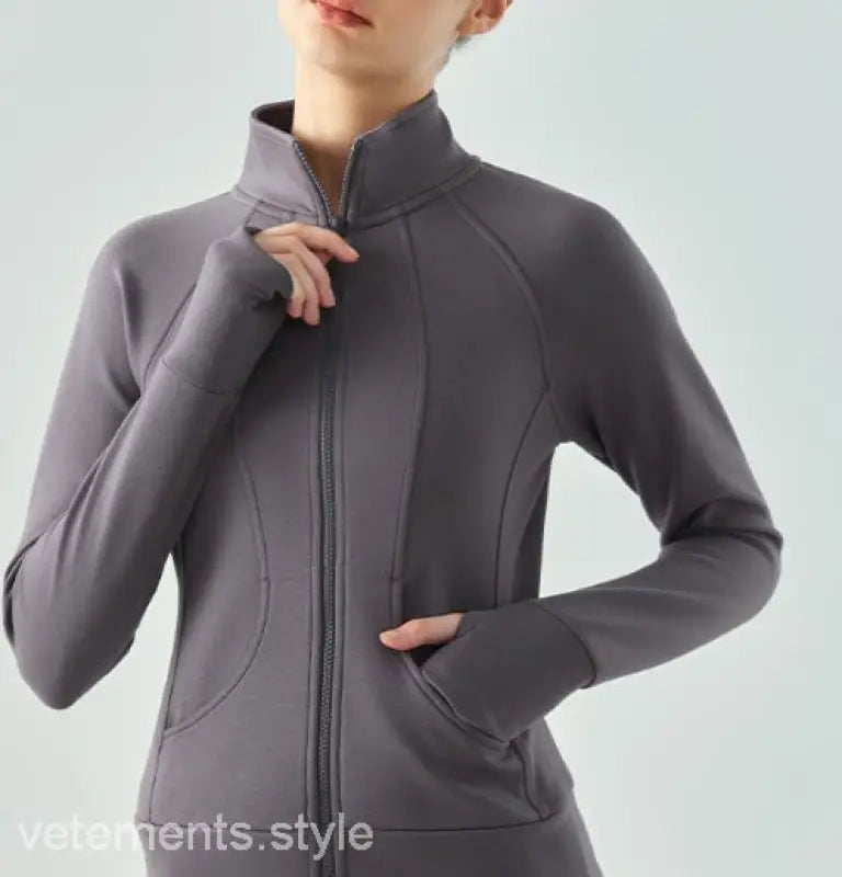 Gray zip-up athletic jacket with high collar, fitted design, in Haiyan Ash for Spring Fall