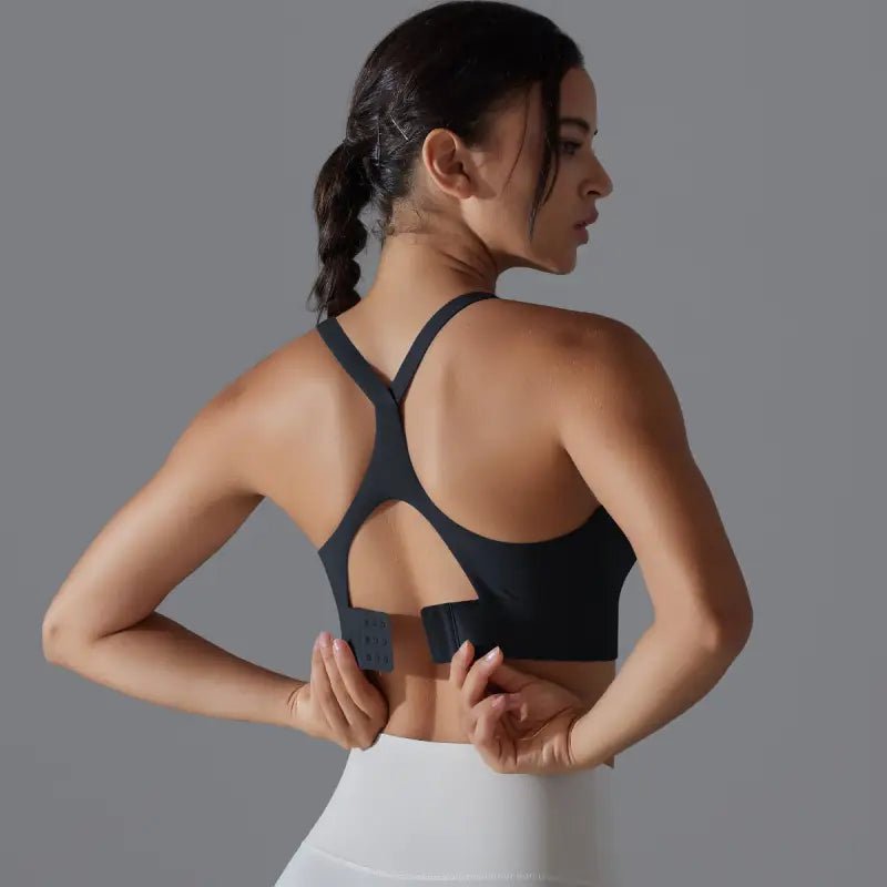 Sporty Backless Yoga Vest with racerback design and adjustable closure for backless yoga workouts