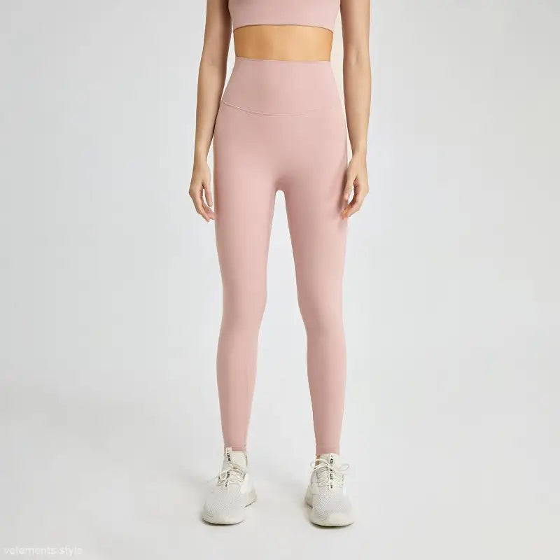 Wild berry high-rise nylon pants with pink leggings and white sneakers