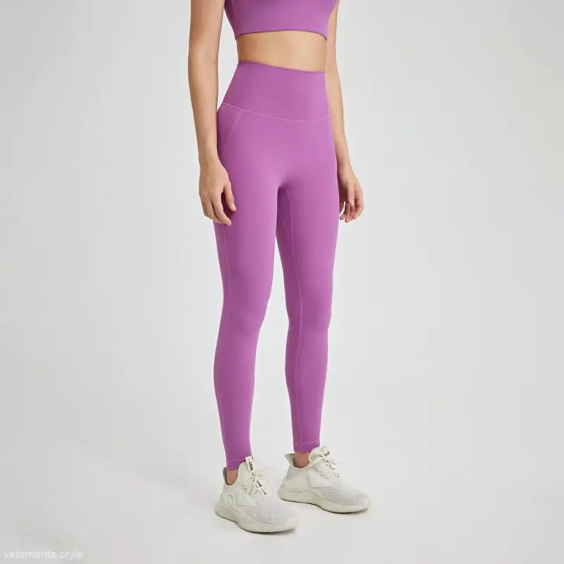 High-waisted lavender leggings in wild berry color, seamless nylon fabric