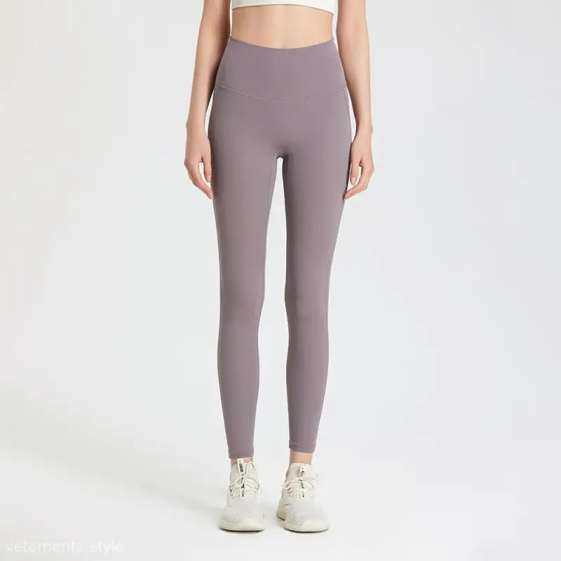 Wild berry color sporty high rise nylon pants with lavender leggings design