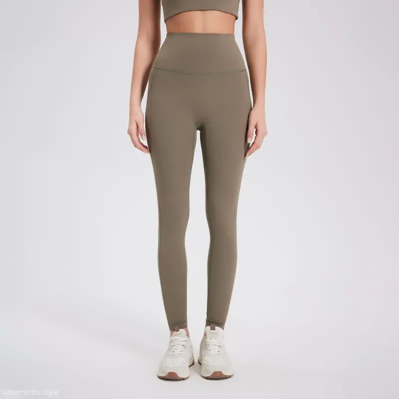 Sporty high rise nylon pants in wild berry color with olive green leggings