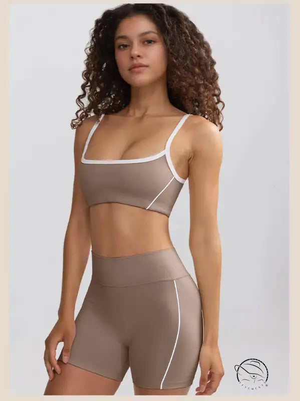 Woman in taupe sports bra and high-rise yoga shorts for summer yoga clothes