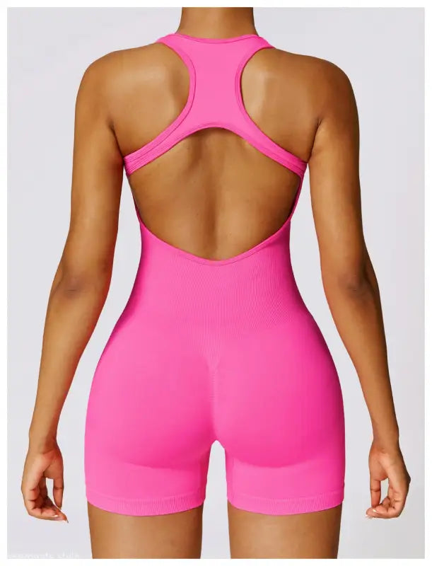 Pink Yoga Bodysuit paired with Sporty High Rise Nylon Shorts in Volcanic Ash
