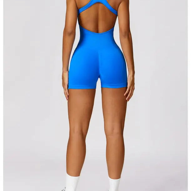 Blue athletic romper in Yoga bodysuit style, paired with Volcanic Ash high rise shorts