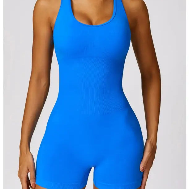Blue racerback bodysuit paired with Volcanic Ash Sporty High Rise Nylon Shorts