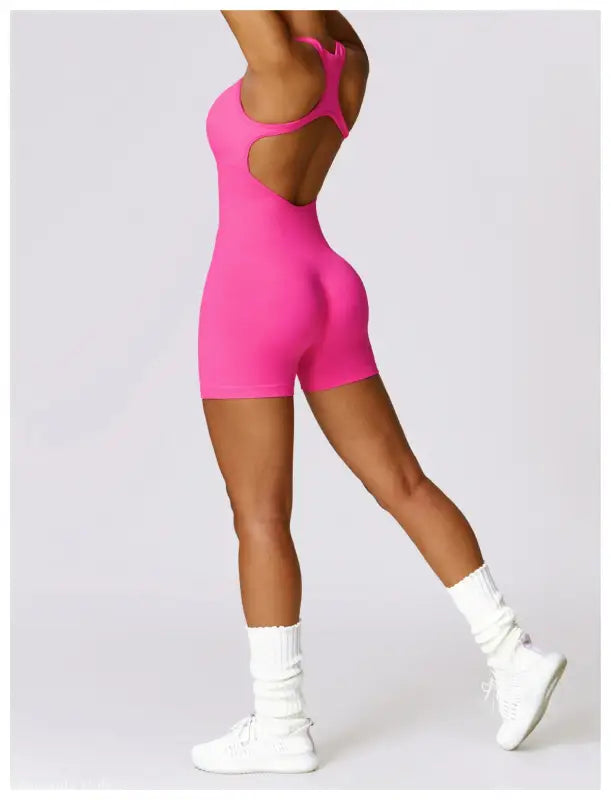 Pink athletic romper with open back from Sporty High Rise Nylon Shorts in Volcanic Ash