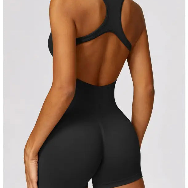 Black athletic romper in Volcanic Ash, perfect as a yoga bodysuit for active wear