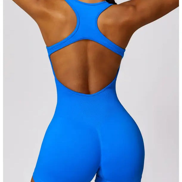 Blue athletic romper designed for active wear, featuring a comfortable fit in Volcanic Ash