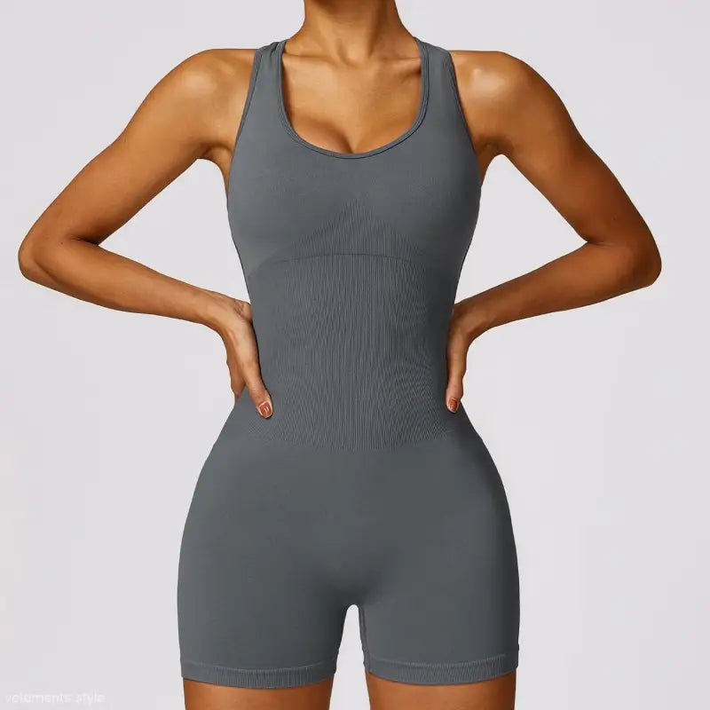 Gray athletic romper featuring Sporty High Rise Nylon Shorts in Volcanic Ash for active wear