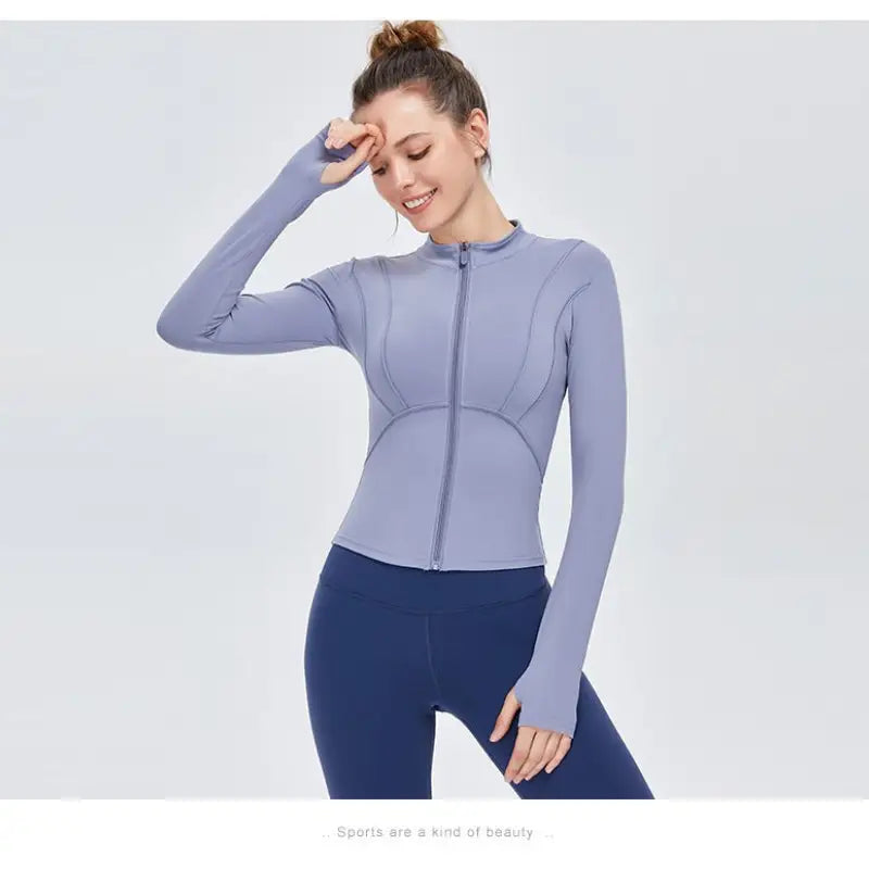 Blue athletic jacket and leggings from Sporty Long Sleeve Nylon Tee in Phantom Black or Dark Gray Purple