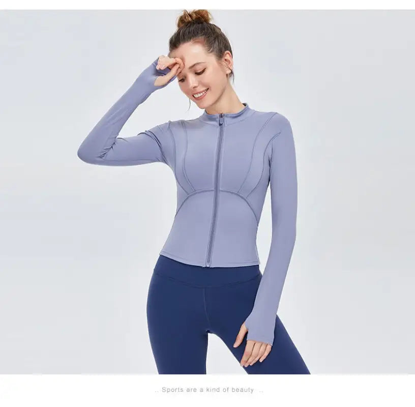 Blue athletic jacket and leggings from Sporty Long Sleeve Nylon Tee in Phantom Black or Dark Gray Purple