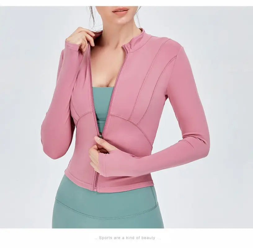 Pink athletic jacket with thumb holes from Sporty Long Sleeve Nylon Tee in Dark Gray Purple