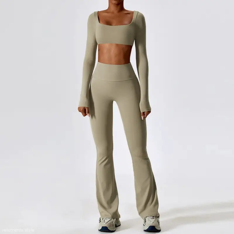 Sage green workout set with long sleeve crop top and flared trousers in camel brown and bean green