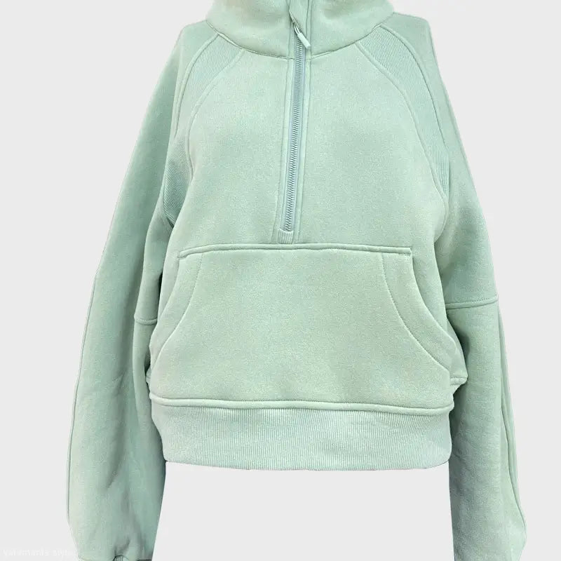 Mint green half-zip sweatshirt with kangaroo pocket for morning running warm workouts
