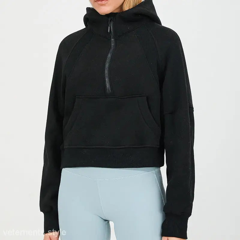 Black cropped hoodie with half-zip and kangaroo pocket for morning running warm workouts