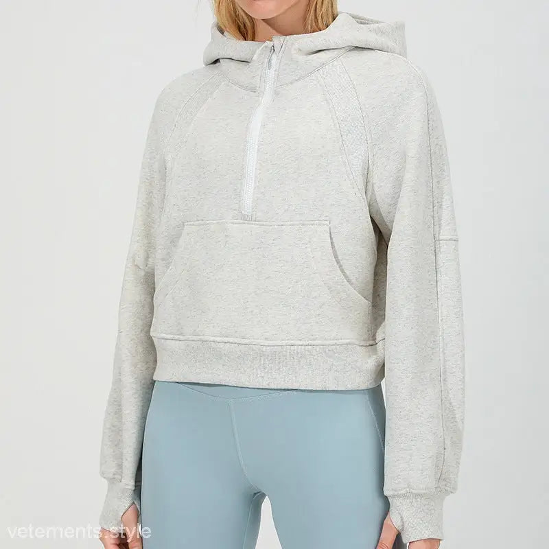 Light gray half-zip hooded sweatshirt with front pocket for morning running warm workouts