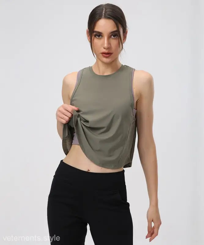 Woman wearing a Chinese Olive Green and Midnight Blue Sporty Nylon Half Waist Blouse