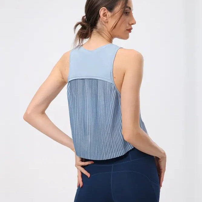 Light blue sleeveless half waist blouse with pleated back panel in Chinese Olive Green and Midnight Blue