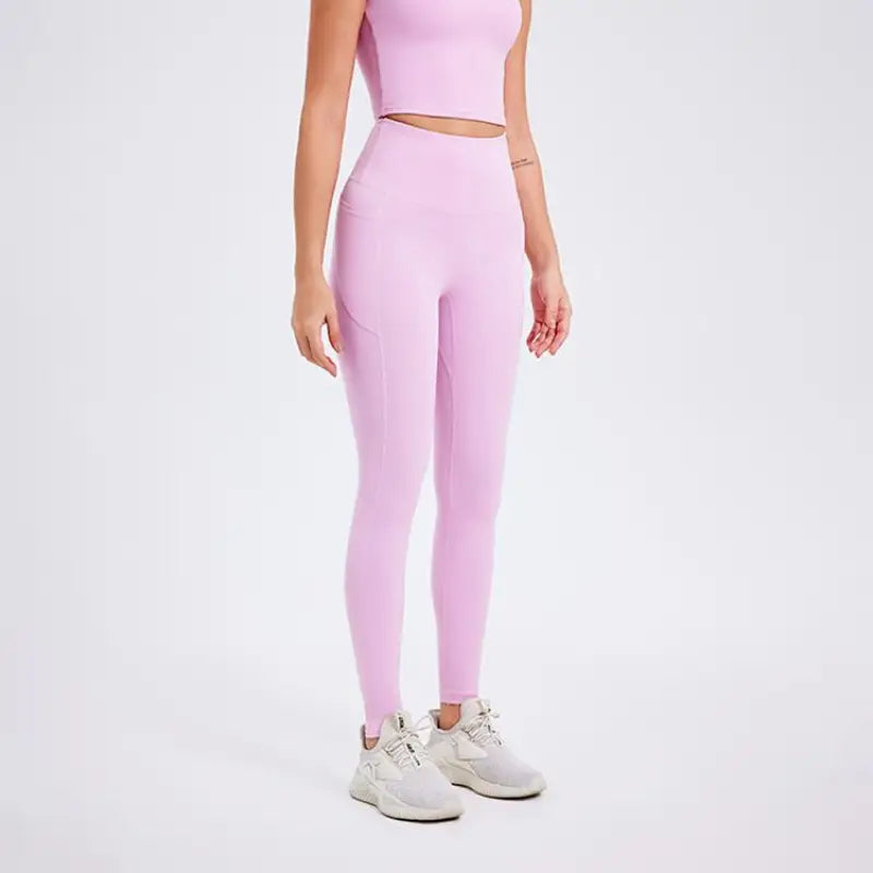 Deep smoky gray sporty nylon pants with lavender cutout high-waisted leggings design