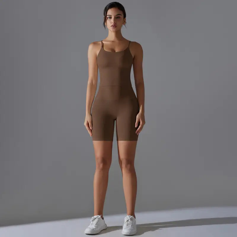 Woman in brown bodysuit wearing sport nylon sleeveless high rise summer shorts yoga