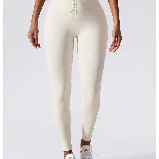Cream-colored high-waisted leggings with drawstring waistband for Sporty Nylon Solid Pants