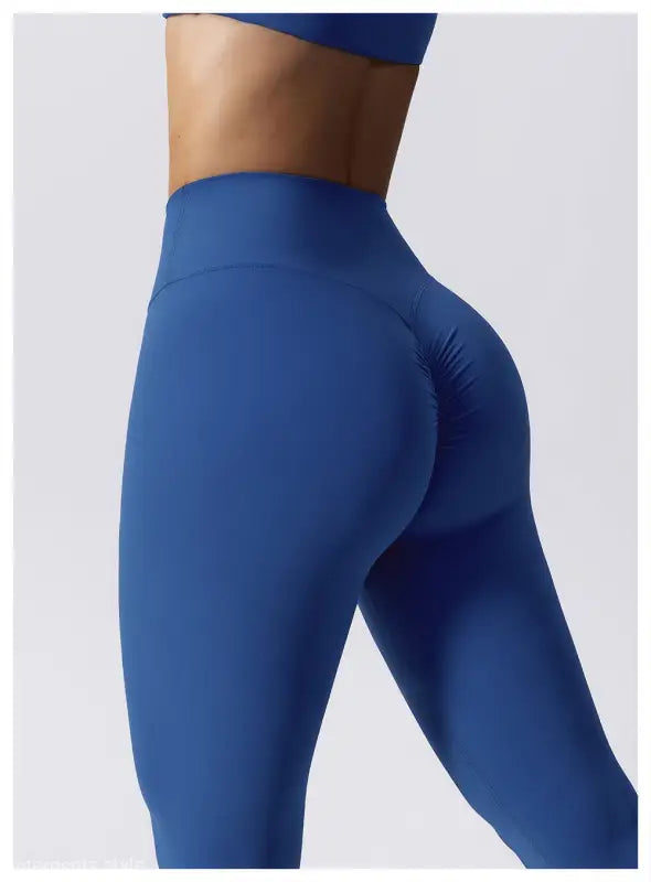 Blue high-waisted athletic leggings, ideal for workouts or yoga, in Night Sky Blue