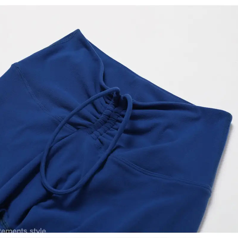 Blue drawstring sweatpants from Sporty Nylon Solid Pants in Night Sky Blue color