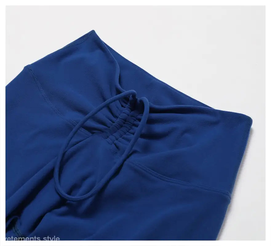 Blue drawstring sweatpants from Sporty Nylon Solid Pants in Night Sky Blue color