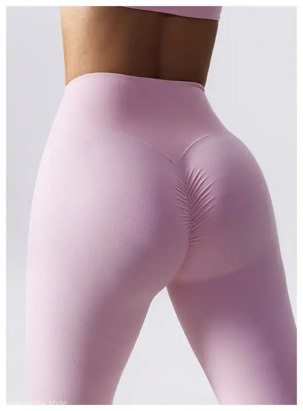 Pink high-waisted seamless workout leggings from Sporty Nylon Solid Pants collection